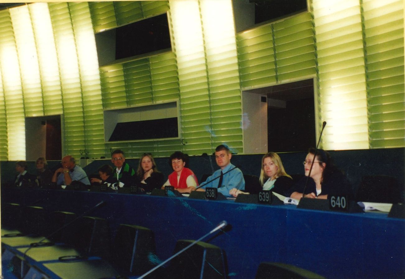 Members seated in a debating chamber